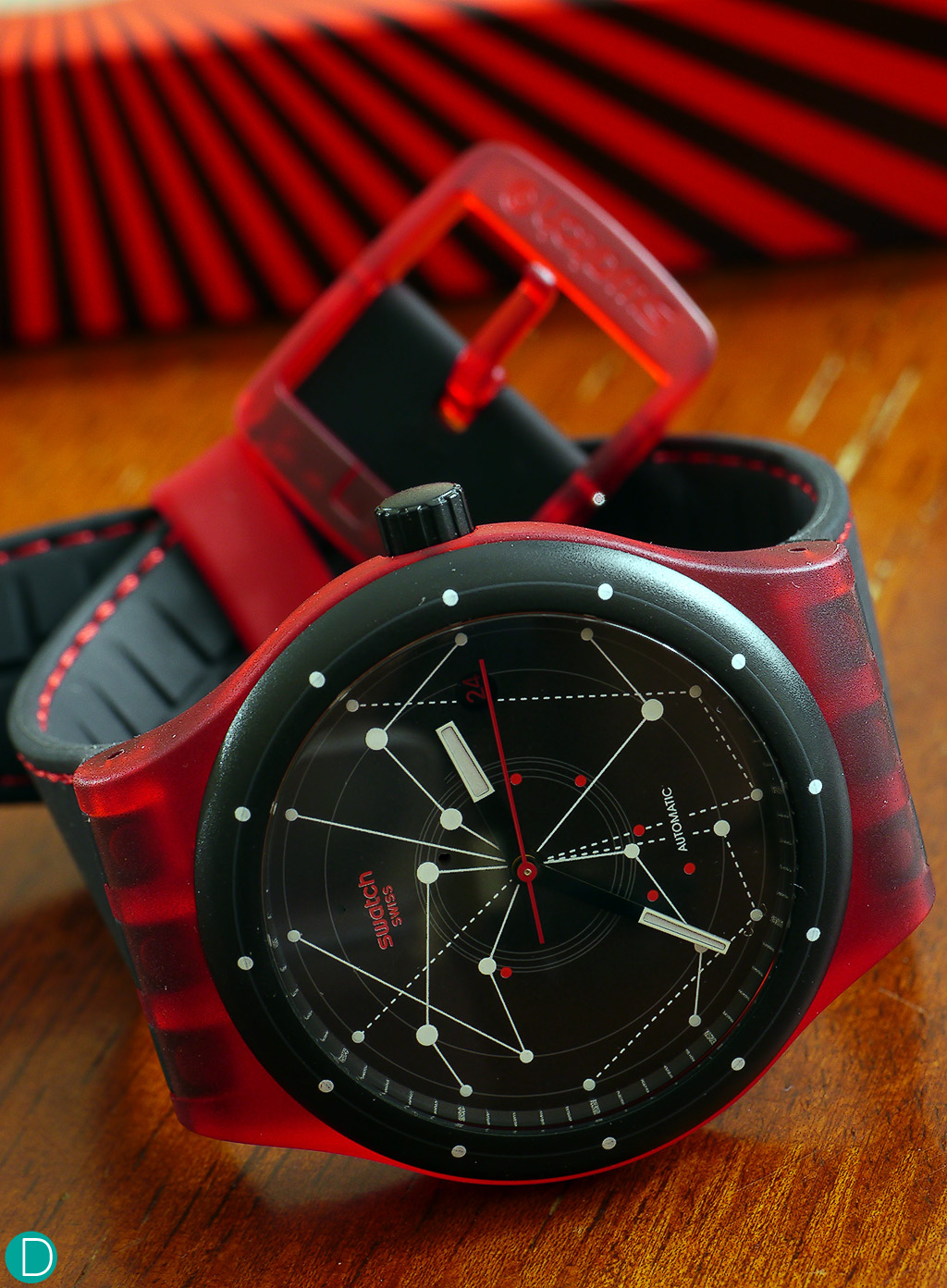 The Swatch Sistem 51, in red.