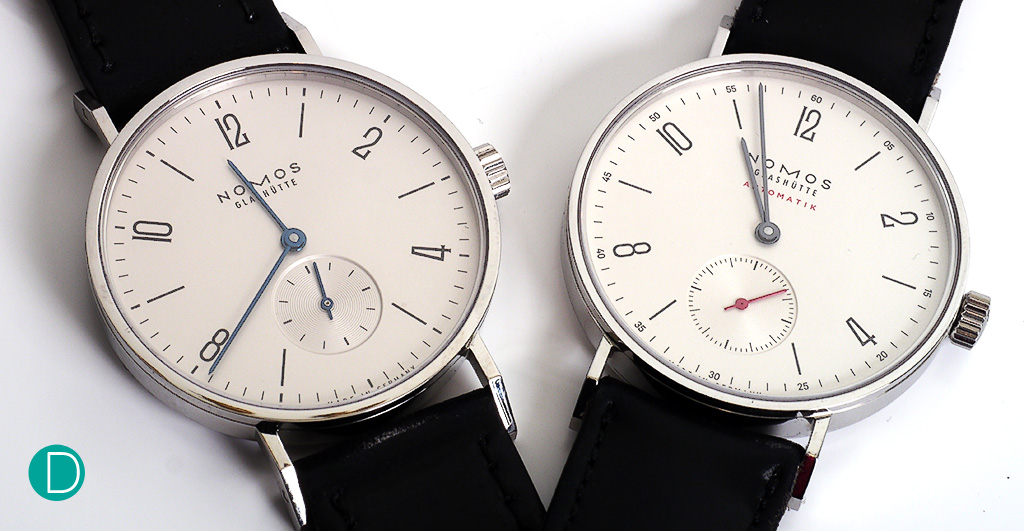 The Nomos Tangente Automatik on the right, with its predecessor (the manual-winding variant) on the left. 