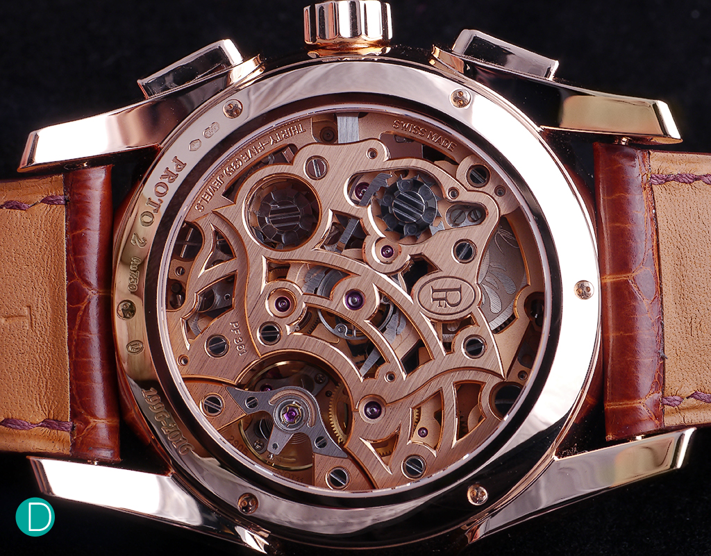 The PF Caliber 361: beautifully designed, laid out and executed in rose gold. Note Michel Parmigiani's signature on the mainspring barrel for the Anniversaire edition.