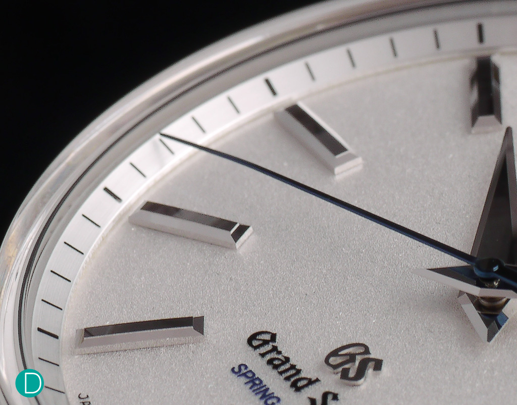 The seconds hand is long and elegant, and is hand rolled so that it is closer to the dial at its end to reduce parallax error.