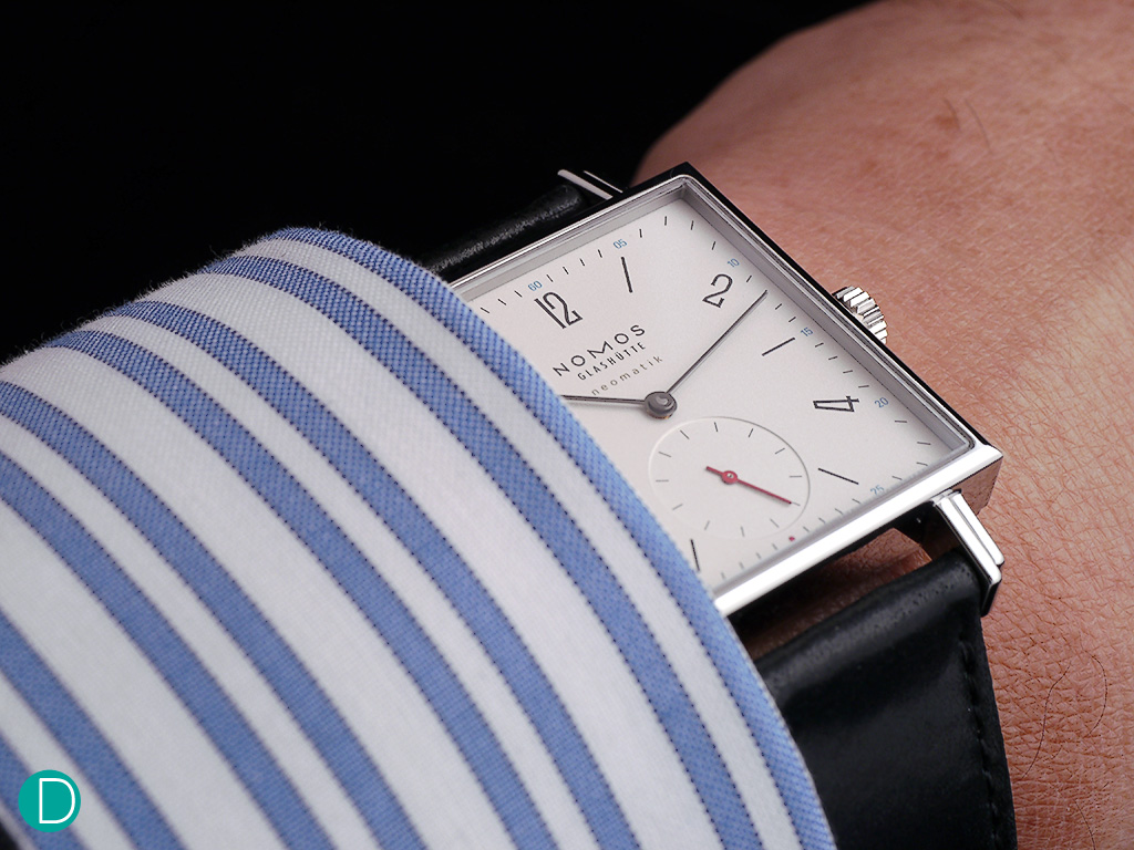 The NOMOS Tetra neomatik, on the wrist. It certainly does look bigger than what we initially thought.