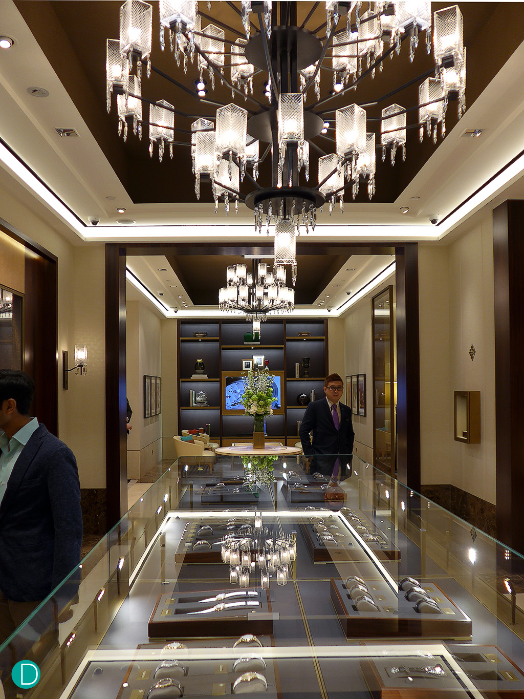 The entrance foyer of the new Patek Philippe boutique, looking towards the left as one enters, into additional rooms which can be closed off for a private customer experience.The showcase is immense, and able to display a larger number of watches for sale.