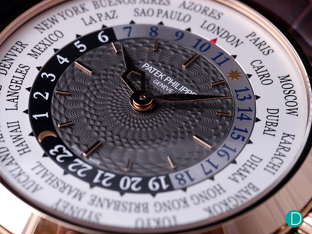 The dial detail on the 5230. The center guilloché medallion looks like its done in relief, and reminds the author of the scales of a crocodile's back.