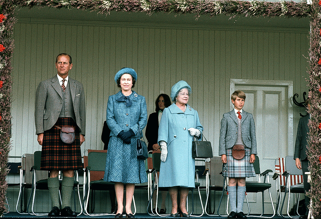 Queen Elizabeth II, her mother, Prince Philip, and Prince Charles attended Scotland's Braemar Gathering in 1975. Prince Philip and Charles are wearing tartan kilts. Image Source: Getty / Anwar Hussein