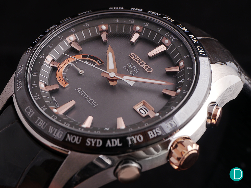 The SSE095 with gold markers and a polished titanium case in a crocodile strap.