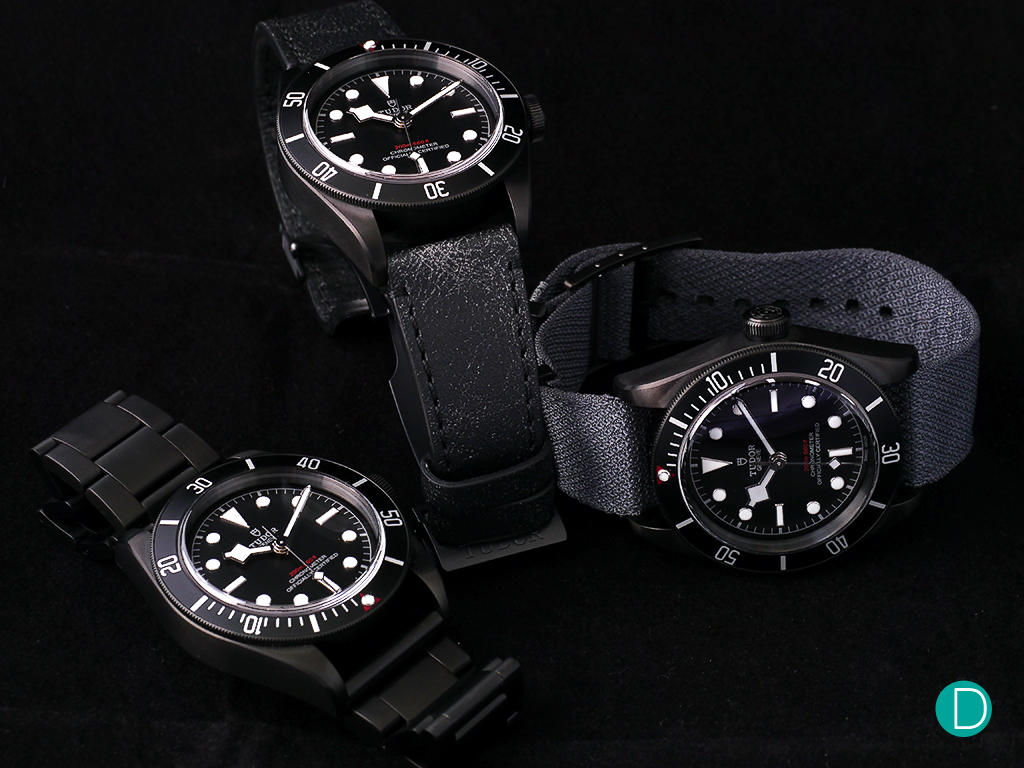 The Tudor Black Bay Dark. Shown here with a dark steel bracelet or a vintage black leather strap which comes with an additional black fabric strap.