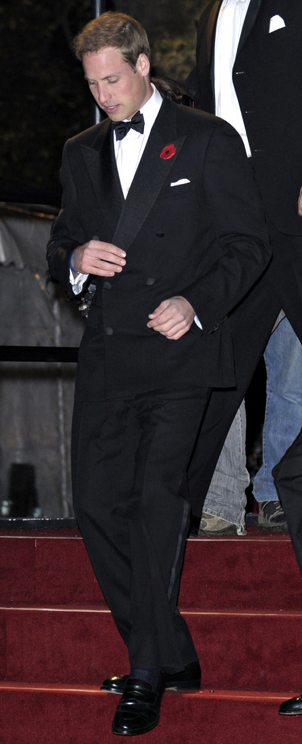 Prince William attends the premiere of the Bond movie "Quantum of Solace", immaculately attired in a double breasted coat in Black Tie. 